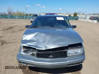 1995 Chevrolet Beretta z VIN 1G1LV15M5SY116047, wystawiony jako IAAI lot #42036344 z przebiegiem 104 222 mil mil oraz . Historia ofert i sprzedaży dostępna na DreamBid. Obrazek 6.