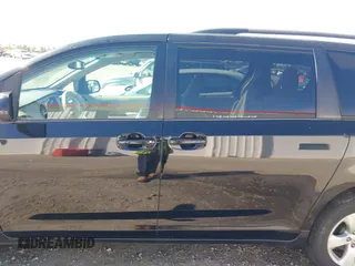 2012 Toyota Sienna LE AAS with VIN 5TDKK3DC3CS263240, listed as a IAAI auction lot 41810686 with 232,026 mi miles. Bid and sale history available at carsss.com. Image 14.