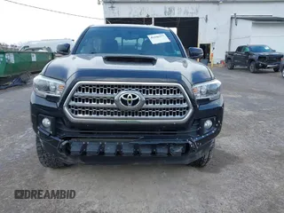 2016 Toyota Tacoma SR with VIN 3TMCZ5AN2GM027945, listed as a IAAI auction lot 41446277 with 51,781 mi miles and . Bid and sale history available at DreamBid. Image 6.