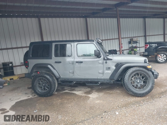 2020 Jeep Wrangler Unlimited Sport S z VIN 1C4HJXDG1LW103364, wystawiony jako IAAI lot #41541954 z przebiegiem 57 735 mil mil oraz . Historia ofert i sprzedaży dostępna na DreamBid. Obrazek 13.
