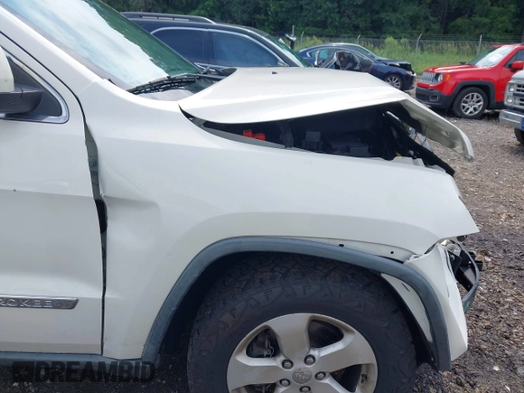 2011 Jeep Grand Cherokee Laredo with VIN 1J4RR4GG7BC701007, listed as a IAAI auction lot 42704995 with 145,956 mi miles and . Bid and sale history available at DreamBid. Image 14.