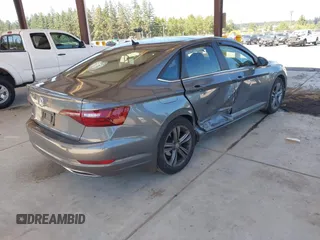 2021 Volkswagen Jetta S with VIN 3VWC57BU7MM001587, listed as a IAAI auction lot 42626242 with 39,548 mi miles and . Bid and sale history available at DreamBid. Image 4.