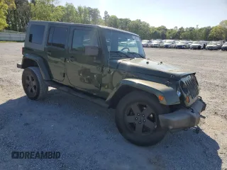 2008 Jeep Wrangler Unlimited Sahara with VIN 1J4GA59148L504608, listed as a Copart auction lot 52400325 with 123,959 mi miles and Salvage Title. Bid and sale history available at carsss.com. Image 4.