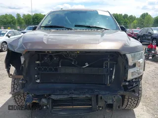 2015 Ford F-150 XL with VIN 1FTEW1CGXFKD07711, listed as a IAAI auction lot 42371362 with 128,186 mi miles and . Bid and sale history available at DreamBid. Image 6.