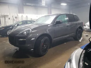 2009 Porsche Cayenne Turbo with VIN WP1AC29P79LA82066, listed as a Copart auction lot 79549214 with 157,355 mi miles and Salvage title. Bid and sale history available at DreamBid. Image 1.