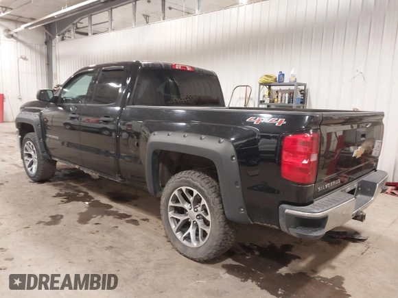 2014 Chevrolet Silverado 1500 LT with VIN 1GCVKREH2EZ225509, listed as a IAAI auction lot 41728865 with 257,709 mi miles and . Bid and sale history available at DreamBid. Image 3.