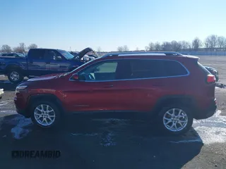 2015 Jeep Cherokee Latitude with VIN 1C4PJLCB4FW730607, listed as a IAAI auction lot 41738845 with 202,216 mi miles and . Bid and sale history available at DreamBid. Image 14.