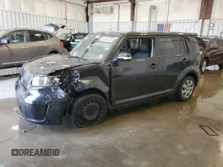 2010 Scion xB with VIN JTLZE4FE7A1109851, listed as a Copart auction lot 52942315 with 135,723 mi miles and Salvage Title. Bid and sale history available at DreamBid. Image 1.