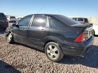 2003 Ford Focus ZTS with VIN 1FAFP38333W249101, listed as a Copart auction lot 77824534 with 163,513 mi miles and Salvage Title. Bid and sale history available at carsss.com. Image 2.