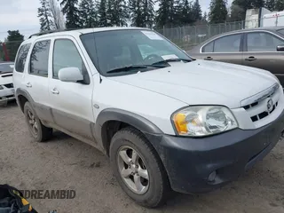 2005 Mazda Tribute LX with VIN 4F2CZ94105KM25420, listed as a IAAI auction lot 41450750 with 148,736 mi miles. Bid and sale history available at carsss.com. Image 1.