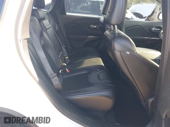 2019 Jeep Cherokee Latitude Plus z VIN 1C4PJLLBXKD308346, wystawiony jako IAAI lot #42146125 z przebiegiem 94 066 mil mil oraz . Historia ofert i sprzedaży dostępna na DreamBid. Obrazek 8.