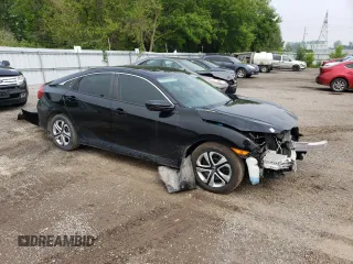 2017 Honda Civic LX z VIN 2HGFC2F55HH030250, wystawiony jako Copart lot #59228905 z przebiegiem 148 692 mil mil oraz Szkoda całkowita • Salvage title. Historia ofert i sprzedaży dostępna na DreamBid. Obrazek 4.