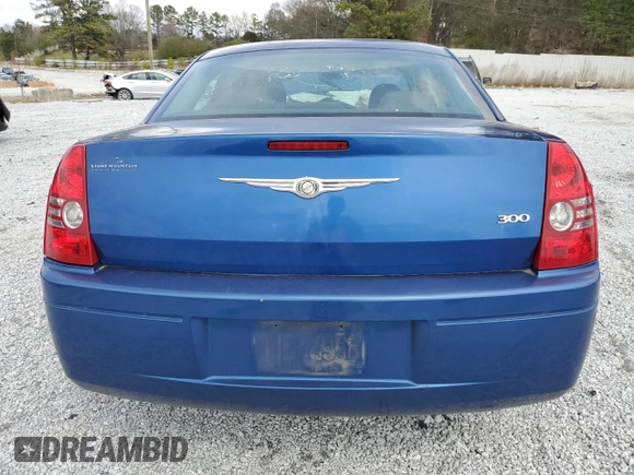 2009 Chrysler 300 LX with VIN 2C3KA43D29H581073, listed as a Copart auction lot 48702345 with 142,917 mi miles and Salvage Title. Bid and sale history available at carsss.com. Image 6.
