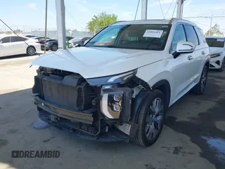 2020 Hyundai Palisade SEL z VIN KM8R44HEXLU128533, wystawiony jako IAAI lot #42094411 z przebiegiem 61 366 mil mil oraz . Historia ofert i sprzedaży dostępna na DreamBid. Obrazek 18.