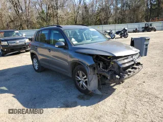 2016 Volkswagen Tiguan S with VIN WVGBV7AX0GW524346, listed as a Copart auction lot 87221564 with 163,609 mi miles and Salvage Title. Bid and sale history available at DreamBid. Image 4.