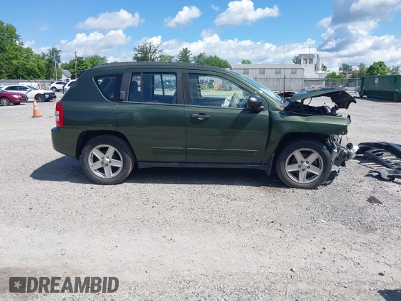 2008 Jeep Compass Sport with VIN 1J8FT47088D714924, listed as a IAAI auction lot 39488653 with 85,964 mi miles. Bid and sale history available at carsss.com. Image 14.