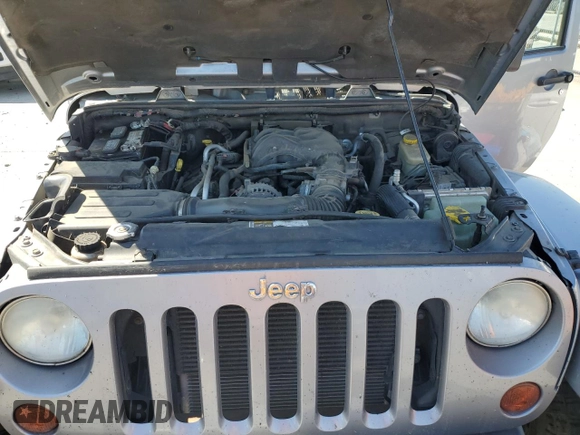 2013 Jeep Wrangler Unlimited Sahara with VIN 1C4BJWEG5DL662756, listed as a Copart auction lot 56423615 with 189,355 mi miles and Salvage title. Bid and sale history available at DreamBid. Image 11.