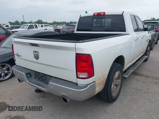 2015 Ram 1500 Lone Star with VIN 1C6RR6GT2FS750861, listed as a IAAI auction lot 42047510 with 127,402 mi miles. Bid and sale history available at carsss.com. Image 4.