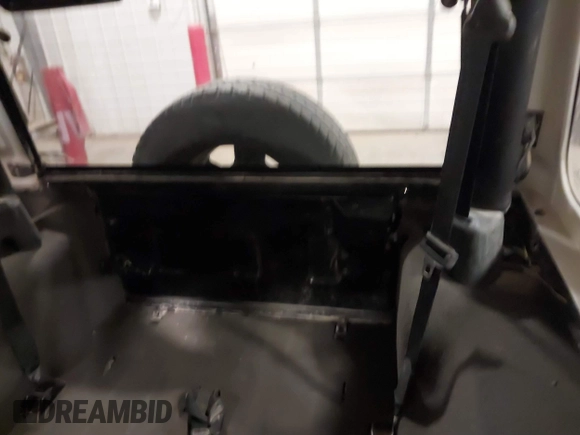 2006 Jeep Wrangler Sport Right Hand Drive with VIN 1J4F449S56P741328, listed as a IAAI auction lot 41476847 with 67,203 mi miles. Bid and sale history available at carsss.com. Image 8.