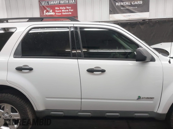 2011 Ford Escape Hybrid с VIN 1FMCU5K36BKC53834, выставлен на аукционе IAAI как лот 42255622 с пробегом 90 271 миль миль и . История ставок и продаж доступна на DreamBid. Изображение 13.