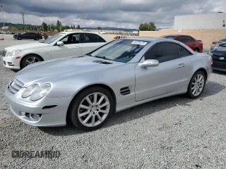 2007 Mercedes-Benz SL 550 z VIN WDBSK71F67F124729, wystawiony jako Copart lot #56720475 z przebiegiem 96 635 mil mil oraz Szkoda całkowita • Salvage title. Historia ofert i sprzedaży dostępna na DreamBid. Obrazek 1.