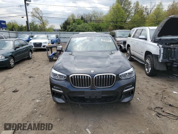 2020 BMW X4 M40i with VIN 5UX2V5C06LLE69603, listed as a Copart auction lot 49705043 with 31,939 mi miles. Bid and sale history available at carsss.com. Image 5.