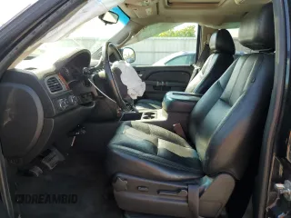 2013 Chevrolet Suburban LT with VIN 1GNSKJE70DR138631, listed as a Copart auction lot 57778185 with 176,934 mi miles and Salvage title. Bid and sale history available at DreamBid. Image 7.