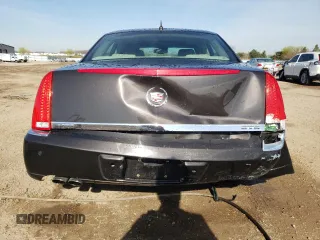 2008 Cadillac DTS 1SC z VIN 1G6KD57Y68U111388, wystawiony jako Copart lot #54204465 z przebiegiem 122 077 mil mil oraz Szkoda całkowita • Salvage title. Historia ofert i sprzedaży dostępna na DreamBid. Obrazek 6.
