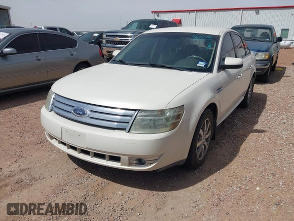 2009 Ford Taurus SEL with VIN 1FAHP24WX9G104546, listed as a IAAI auction lot 42047740 with 111,790 mi miles. Bid and sale history available at carsss.com. Image 2.