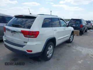 2011 Jeep Grand Cherokee 70th Anniversary with VIN 1J4RR4GG4BC562003, listed as a IAAI auction lot 42022419 with 231,786 mi miles. Bid and sale history available at carsss.com. Image 4.