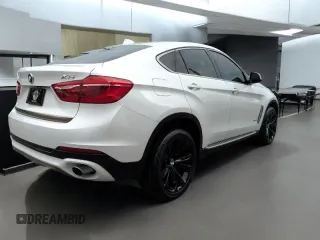 2017 BMW X6 xDrive35i z VIN 5UXKU2C38H0U30XXX, wystawiony jako Copart lot #60346505 z przebiegiem 70 591 mil mil oraz Czysty tytuł • Clean title. Historia ofert i sprzedaży dostępna na DreamBid. Obrazek 3.