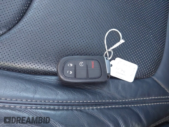 2015 Jeep Cherokee Limited with VIN 1C4PJMDS2FW523024, listed as a IAAI auction lot 41745699 with Not Provided miles and . Bid and sale history available at DreamBid. Image 11.