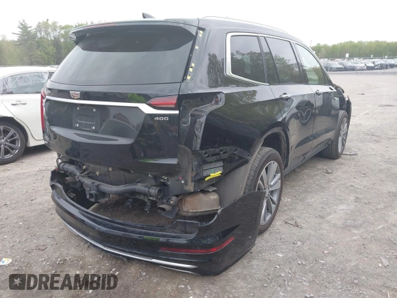 2022 Cadillac XT6 Premium Luxury with VIN 1GYKPDRS5NZ149971, listed as a IAAI auction lot 42259140 with 51,704 mi miles and . Bid and sale history available at DreamBid. Image 4.