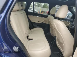 2017 BMW X1 xDrive28i with VIN WBXHT3C3XH5F69573, listed as a Copart auction lot 52719715 with 93,981 mi miles and Salvage Title. Bid and sale history available at DreamBid. Image 11.