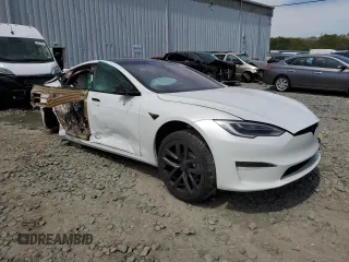 2022 Tesla Model S Plaid with VIN 5YJSA1E63NF460643, listed as a Copart auction lot 54665505 with Not provided miles and Salvage title. Bid and sale history available at DreamBid. Image 4.