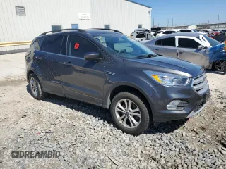 2018 Ford Escape SE with VIN 1FMCU9GD8JUD58290, listed as a Copart auction lot 48539545 with 78,815 mi miles and Salvage Title. Bid and sale history available at carsss.com. Image 4.