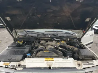 2000 Land Rover Range Rover z VIN SALPV1645YA445526, wystawiony jako Copart lot #59591285 z przebiegiem 158 729 mil mil oraz Szkoda całkowita • Salvage title. Historia ofert i sprzedaży dostępna na DreamBid. Obrazek 12.