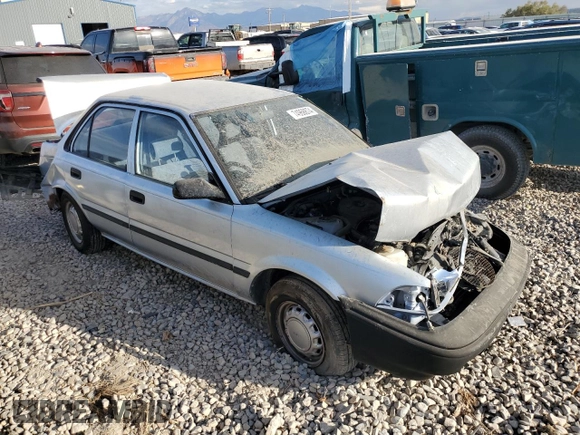 1988 Toyota Corolla with VIN JT2AE92E9J3140852, listed as a Copart auction lot 74968874 with 169,427 mi miles and Salvage title. Bid and sale history available at DreamBid. Image 4.