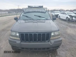 2002 Jeep Grand Cherokee Laredo with VIN 1J4GW48S92C294116, listed as a IAAI auction lot 42080375 with 154,108 mi miles and . Bid and sale history available at DreamBid. Image 6.