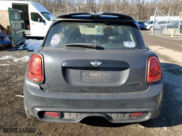 2014 MINI Cooper Hardtop S with VIN WMWXM7C54ET970410, listed as a Copart auction lot 87269984 with NaN miles and Salvage Title. Bid and sale history available at carsss.com. Image 6.