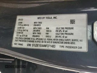 2022 Tesla Model 3 with VIN 5YJ3E1EA4NF371483, listed as a Copart auction lot 49287665 with 59,476 mi miles and Salvage Title. Bid and sale history available at DreamBid. Image 13.