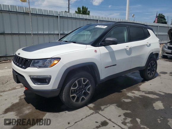 2020 Jeep Compass Trailhawk with VIN 3C4NJDDB1LT189240, listed as a Copart auction lot 57876235 with 70,309 mi miles and Salvage title. Bid and sale history available at DreamBid. Image 1.