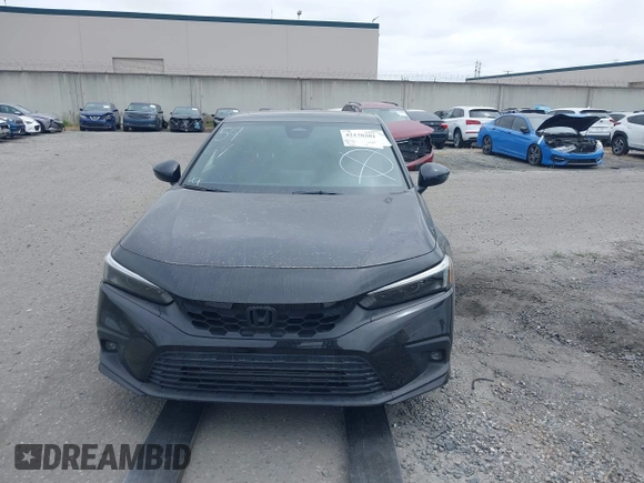 2023 Honda Civic Sport Touring z VIN 19XFL1H80PE009154, wystawiony jako IAAI lot #42170202 z przebiegiem 17 291 mil mil oraz . Historia ofert i sprzedaży dostępna na DreamBid. Obrazek 13.