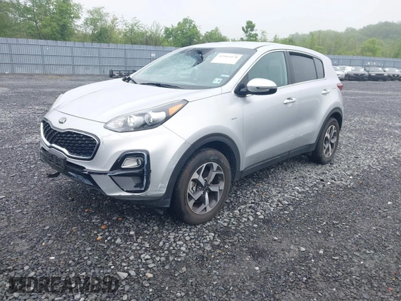 2021 Kia Sportage LX z VIN KNDPMCAC8M7915382, wystawiony jako IAAI lot #42265478 z przebiegiem 20 117 mil mil oraz . Historia ofert i sprzedaży dostępna na DreamBid. Obrazek 2.