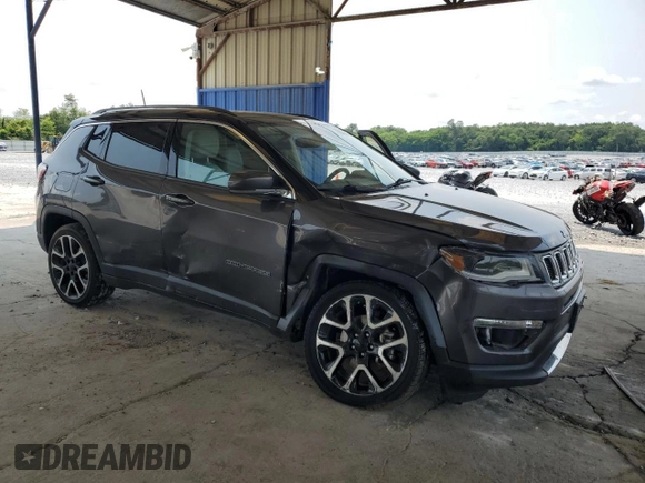 2018 Jeep Compass Limited with VIN 3C4NJDCB0JT399987, listed as a Copart auction lot 59104685 with 71,673 mi miles and Salvage title. Bid and sale history available at DreamBid. Image 4.