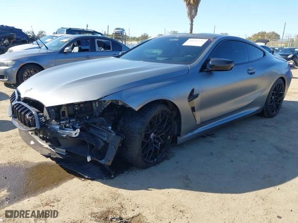2023 BMW M8 Competition with VIN WBSAE0C0XPCM48877, listed as a IAAI auction lot 41676318 with 18,572 mi miles. Bid and sale history available at carsss.com. Image 18.