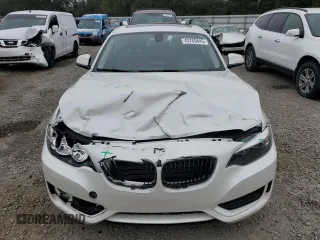 2015 BMW 2 Series 228i with VIN WBA1F5C55FV257705, listed as a Copart auction lot 43765845 with 79,905 mi miles and Salvage Title. Bid and sale history available at carsss.com. Image 5.