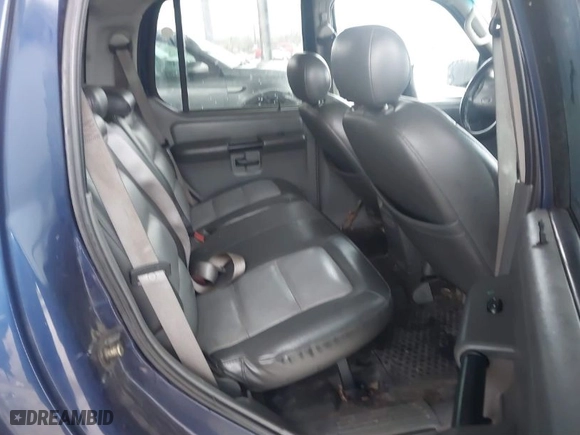 2004 Ford Explorer Sport Trac XLS with VIN 1FMZU77K84UB98509, listed as a IAAI auction lot 41557833 with 1 mi miles. Bid and sale history available at carsss.com. Image 8.