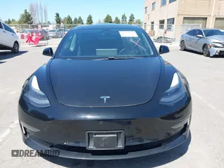 2021 Tesla Model 3 Long Range with VIN 5YJ3E1EB4MF064631, listed as a IAAI auction lot 41424856 with 95,511 mi miles and . Bid and sale history available at DreamBid. Image 12.