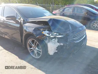 2013 Ford Fusion Titanium with VIN 3FA6P0K99DR374510, listed as a IAAI auction lot 42050026 with 133,227 mi miles and . Bid and sale history available at DreamBid. Image 6.